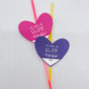 glow stick valentine cards on white background